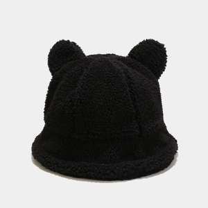 Close-up of black fleece bucket hat featuring cute 3D bear ears and thick warm material