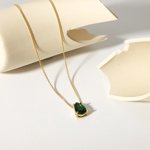 Elegant 18k gold plated stainless steel necklace featuring a green pear-shaped zircon pendant