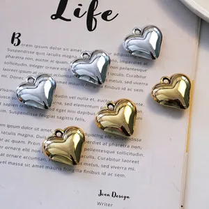 Polished laser acrylic heart charms in gold and silver finish for DIY keychains