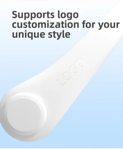 Close-up of matte white portable neck fan arm showing custom logo engraving detail