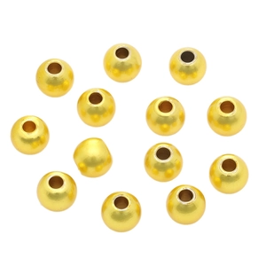 Polished 14K gold filled spacer beads for DIY jewelry making on white background