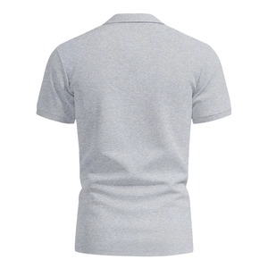 Detailed macro view of gray men's polo shirt featuring breathable knitted fabric texture