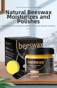 Close-up of wood seasoning beeswax jar and box with sponge applicator kit