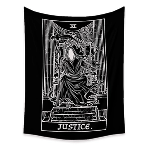 Macro detail of Justice Tarot tapestry featuring gothic skull and grim reaper motifs