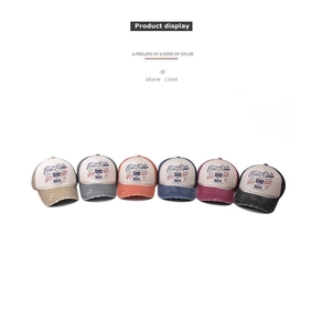 Collection of distressed cotton baseball caps with East Side embroidery and ripped brim details