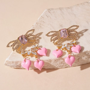 Sweet pink zircon heart earrings with crystal wings and gold-plated dangle heart charms