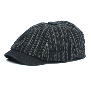 Classic striped black newsboy cap for men and women featuring vintage 8-panel stitch design