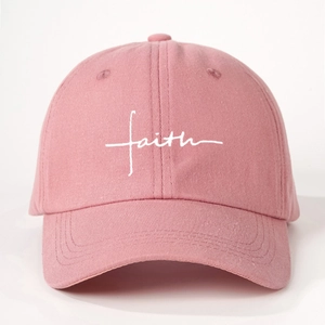 Pink washed cotton baseball cap with white faith embroidery and adjustable strap