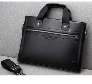 Close-up of black lychee grain leather business briefcase with detachable shoulder strap