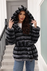 Detail of hooded faux fur coat featuring grey and black stripes and matching waist belt