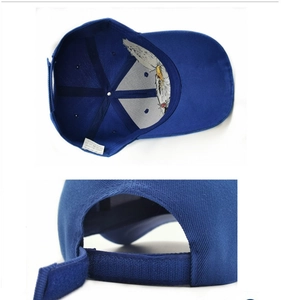 Detail view of the royal blue baseball cap interior with wash label and adjustable strap