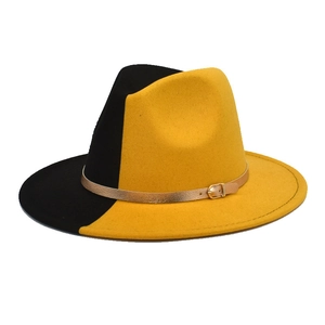 Side view of bicolor black and yellow wide brim jazz hat with gold buckle detail