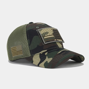 Detail view of camouflage tactical baseball cap with breathable mesh and US flag patch
