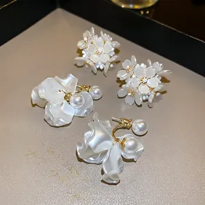 Elegant white flower tassel pearl earrings with floral cluster design for women