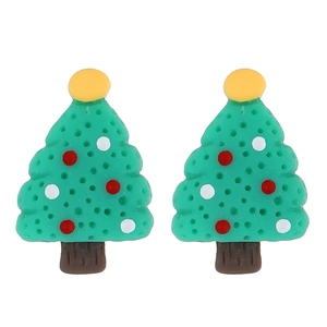 Close-up of resin Christmas tree earrings with detailed honeycomb texture and festive dots