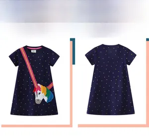 Flat lay view of a navy A-line dress with star prints and unicorn embroidery detail