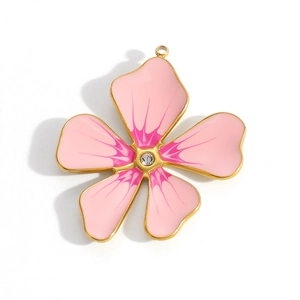 Detailed close-up of a pink 18k gold-plated five-petal flower pendant with a clear rhinestone