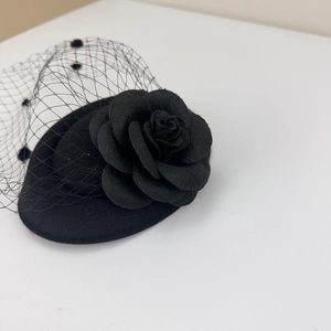 Vintage black fascinator hat hair clip with fabric rose and polka dot mesh veil