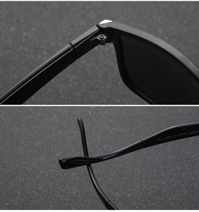 Detail view of durable metal hinges and curved temples on black sports sunglasses