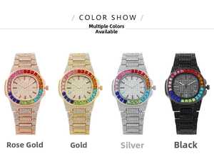 Detailed view of four iced-out quartz watches with rainbow bezels and date display dials