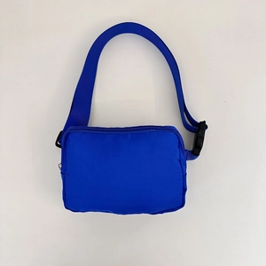 Royal blue nylon belt bag for outdoor sports featuring adjustable strap and buckle closure