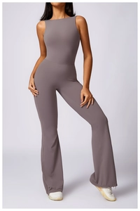 Front view of sleeveless mauve flared yoga jumpsuit with high waist and slim fit
