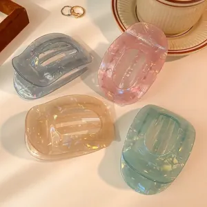Set of four premium marble texture acetate hair claws in elegant assorted pastel colors