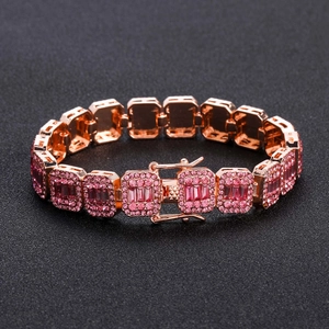 Close-up of 13mm rose gold Cuban chain link with pink cubic zirconia in hip hop style