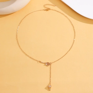 Minimalist gold badminton racket pendant necklace with sparkling crystal tassels for women