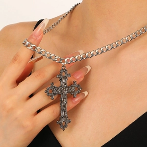 Gothic silver cross pendant necklace with chunky Cuban chain for a punk vintage fashion look