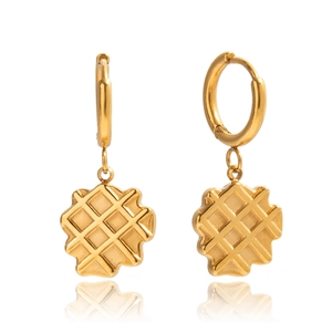 Detailed view of gold plated waffle pattern earrings with polished square pendants
