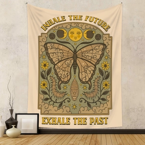 Artistic butterfly tapestry with Inhale the Future quote hanging on a neutral wall