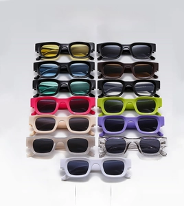 Flat lay display of colorful square frame retro sunglasses in 13 various candy colors