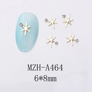 Détail de bijoux d'ongles étoile en alliage doré 6x8mm avec strass brillants pour nail art