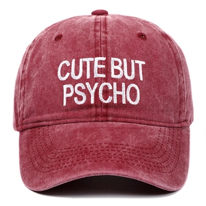 Vintage washed red baseball cap with white CUTE BUT PSYCHO letter embroidery