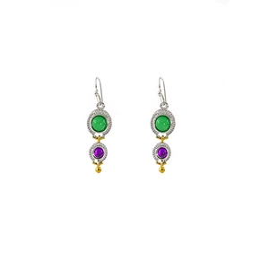 Detail of bohemian drop earrings with green and purple gemstones and gold bead accents