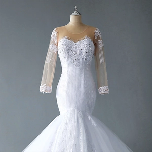 Mermaid lace wedding dress with long sleeves, sequins and sweetheart neckline in white