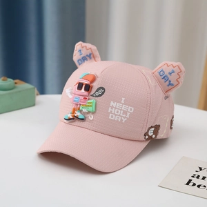 Close-up of pink children's baseball cap with 3D ears and 'I NEED HOLIDAY' embroidery