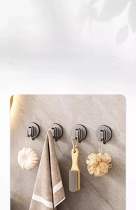 Detail showing set of 4 heavy duty suction cup hooks with hanging bath accessories