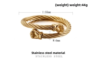 Detail shot of golden braided stainless steel cuff bracelet with fist ends and 55mm inner diameter