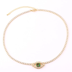 Tennis chain necklace with green eye zircon pendant and gold-plated finish on white background
