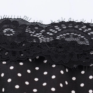 Polka dot tank top with black lace trim and asymmetrical hem for women casual autumn wear