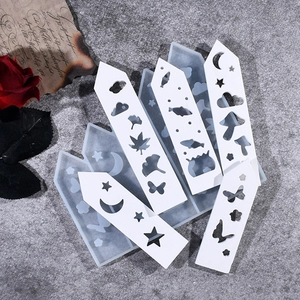 Macro detail of long pointed silicone resin molds with hollow star and leaf patterns