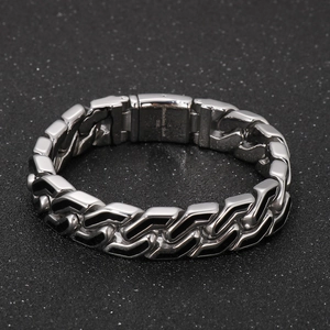 Detail of 316L stainless steel men's bracelet with black enamel punk stripes