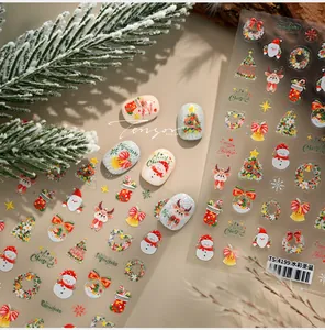 Detailed watercolor Christmas nail stickers featuring Santa, reindeer, and snowmen designs