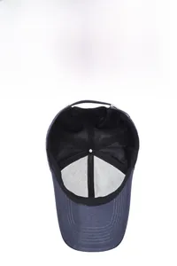 Detail view of the breathable mesh lining and inner structure of the navy baseball cap