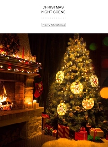 Close-up of LED Christmas hanging lights with Santa and snowman patterns on a tree