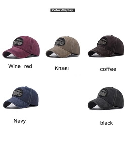 Detailed flat lay of washed cotton baseball caps in five vintage colors with embroidery