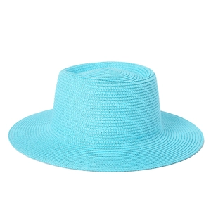 Detailed close-up showing the fine texture of this bright blue woven boater straw hat