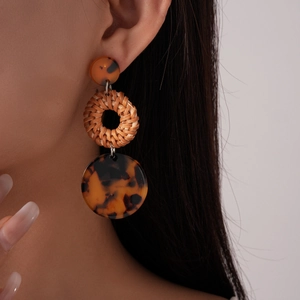 Bohemian rattan and resin circular drop earrings for women with a vintage aesthetic